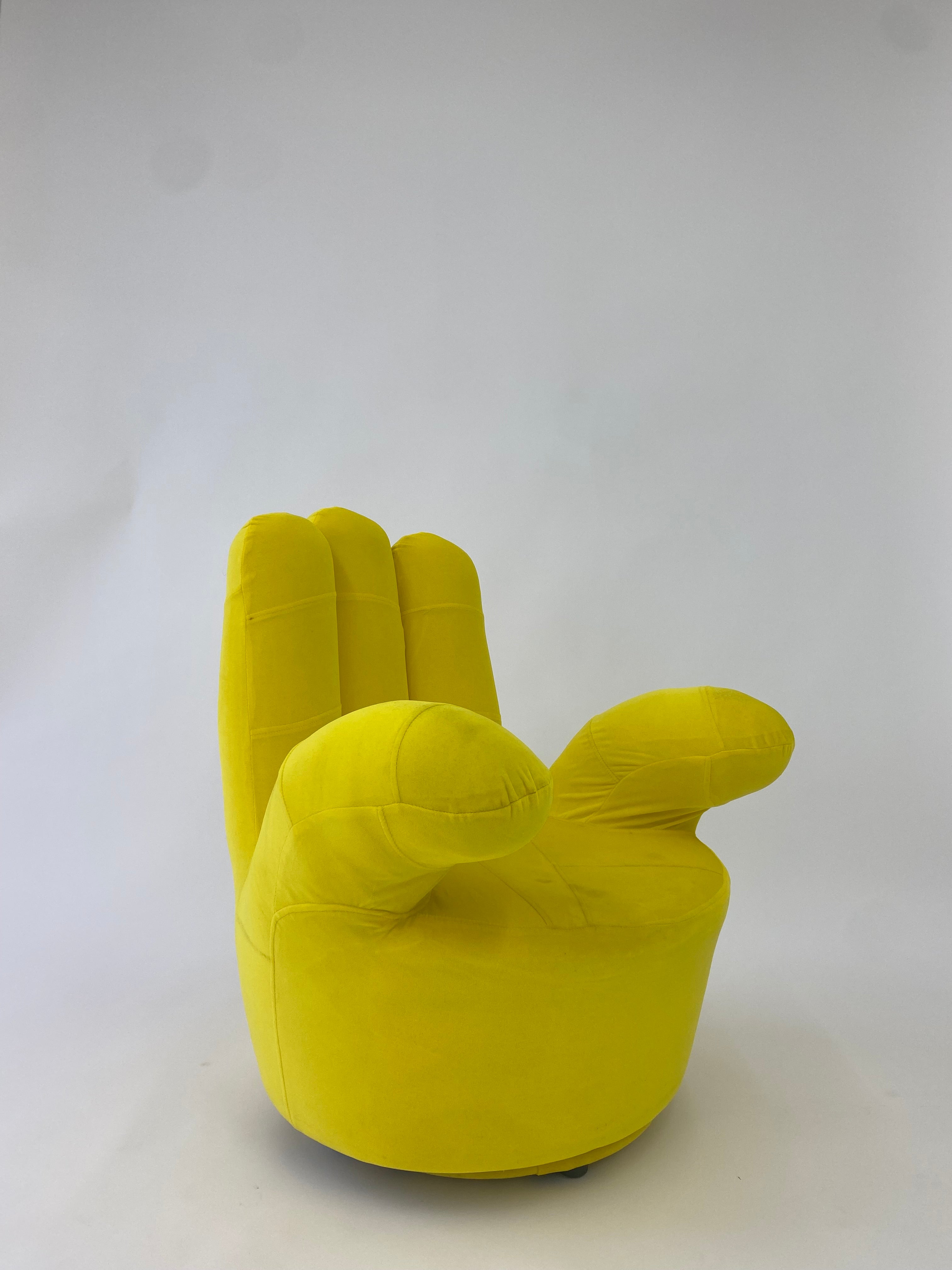 Yellow Suede Hand Shaped Swivel Chair Tossed