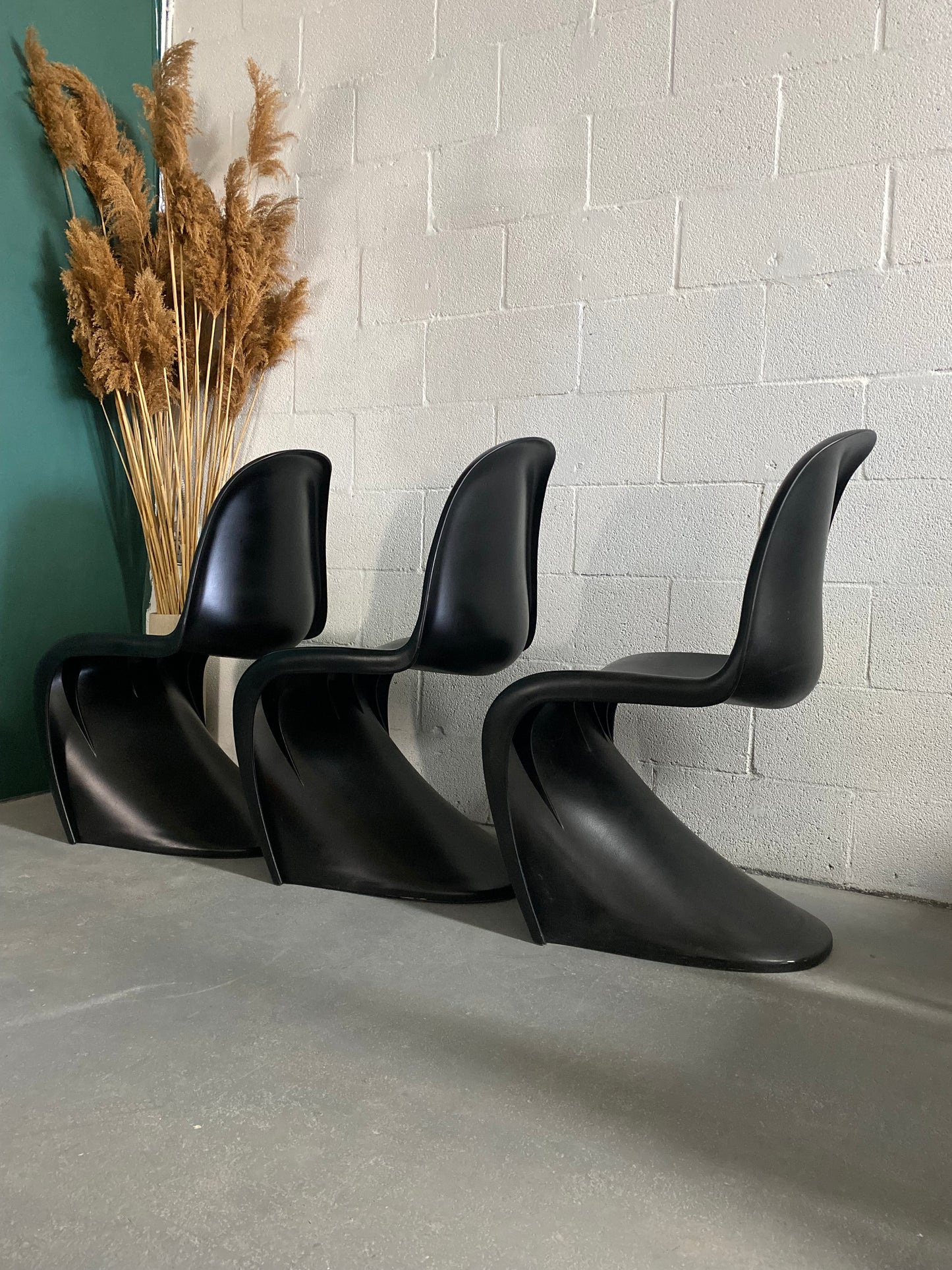 Black Molded Plastic S- Shape Chairs