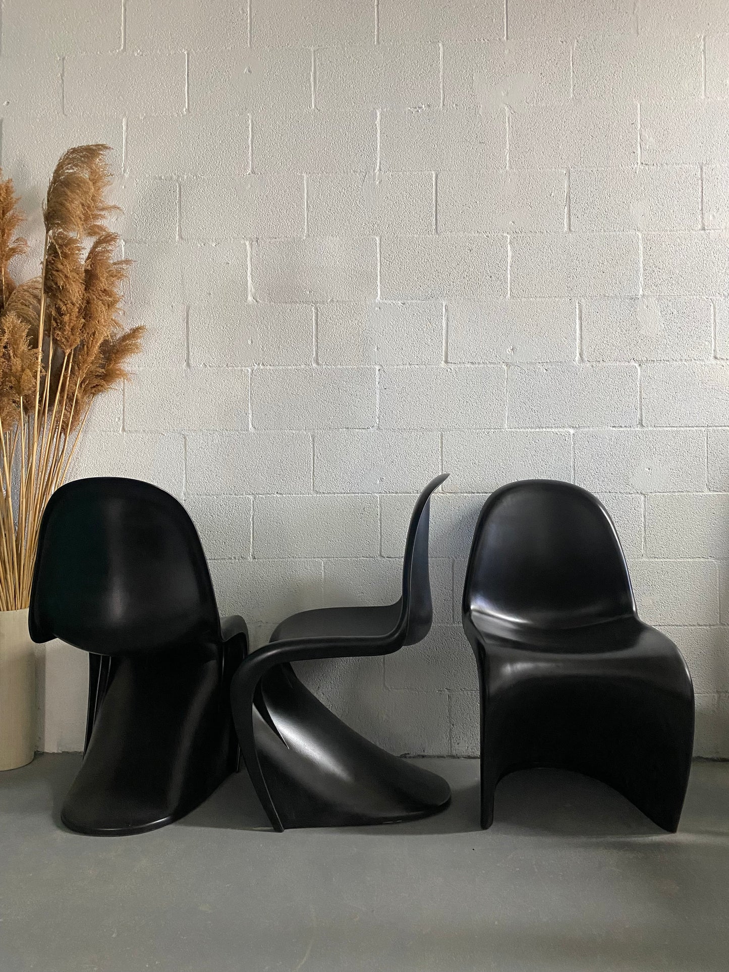 Black Molded Plastic S- Shape Chairs