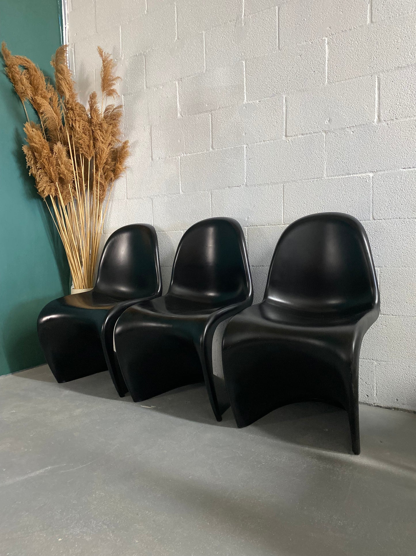 Black Molded Plastic S- Shape Chairs